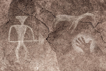 The image on the wall of the cave drawn by an ancient man. history, epoch, archeology.
