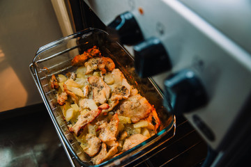Delicious gourmet potato with fried meat in bowl