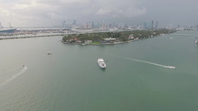 Large Luxury Yacht In Miami Harbor Waterway Skyline Aerial.mov