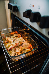 Delicious gourmet potato with fried meat in bowl