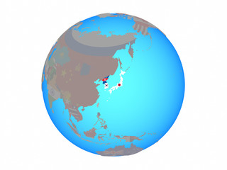 Japan and Korea with national flags on blue political globe. 3D illustration isolated on white background.