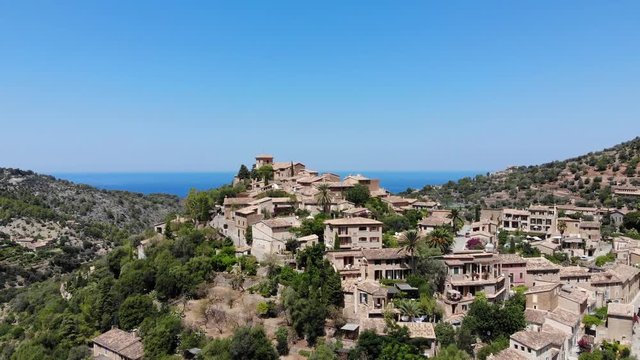 Flight over Mountain Village Deia in Mallorca Tramuntana Mountains, Region Valldemossa and Soller