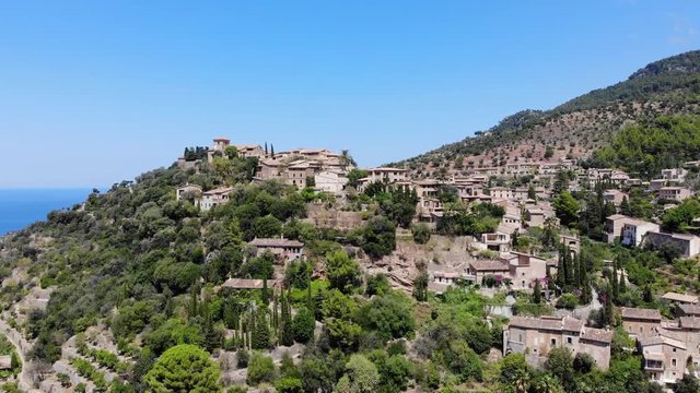Flight over Mountain Village Deia in Mallorca Tramuntana Mountains, Region Valldemossa and Soller