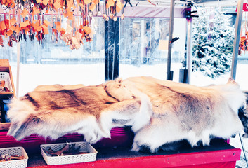 Market stall with traditional souvenirs such as Reindeer fur