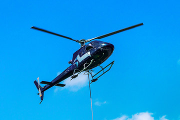 Fototapeta na wymiar Helicopter flying sky in Lavaux Switzerland