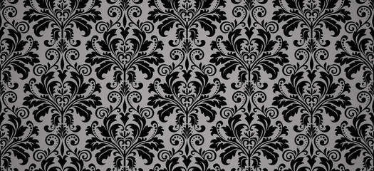 Fototapeta premium Wallpaper in the style of Baroque. Seamless vector background. Black and grey floral ornament. Graphic pattern for fabric, wallpaper, packaging. Ornate Damask flower ornament