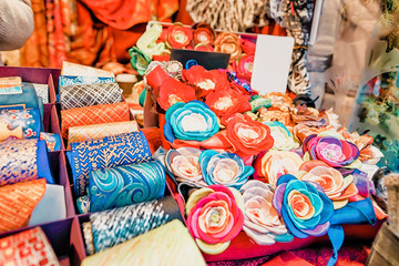 Festive handmade ties and flower brooches Riga Christmas market