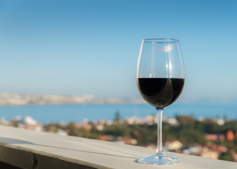 Glass of red wine with lipstick mark