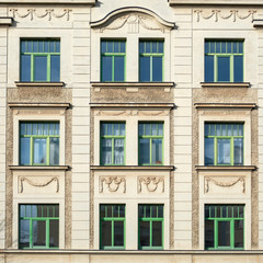 Fototapeta na wymiar renovated vintage house main facade with decorated windows pattern, Gera city in Thuringen, Germany