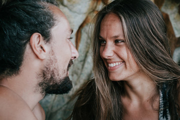 Lovely couple flirting at the beach