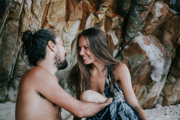 Lovely couple flirting at the beach