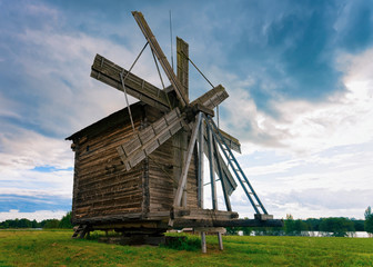 Fototapeta na wymiar Wooden wind mill at Kizhi Pogost in Karelia
