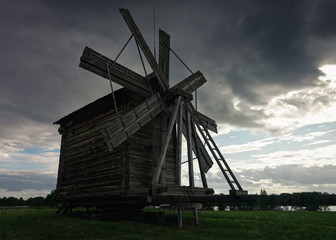 Fototapeta na wymiar Wooden wind mill at Kizhi Pogost Karelia