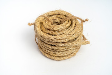 Coil of fiber rope sisal small on isolated white background