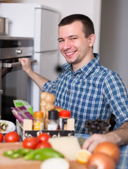 guy off the oven in the kitchen