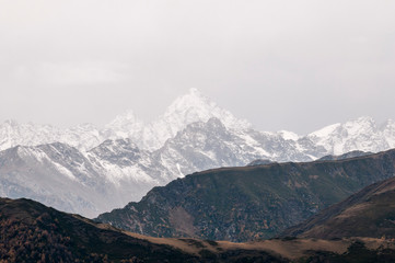 Dark mountain landscape. Caucasian mountains in cloudy weather.
