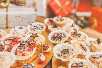 Homemade colourful Christmas Muffins made by children