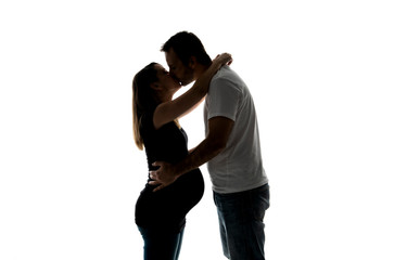 A Pregnant woman with man on studio isolated on white