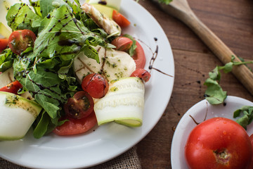fresh salad with tomatoes and cheese