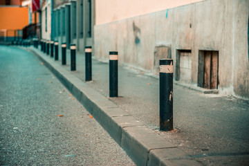 Street bollards that limits the parking space or forbids parking on the sidewalk