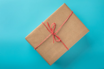 Flat lay of gift on blue background