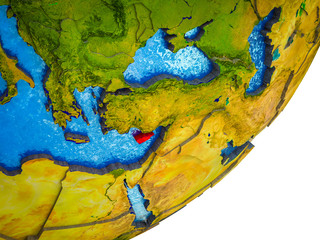 Cyprus on 3D model of Earth with water and divided countries.