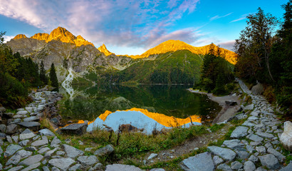mountain lake during sunrise - Morskie Oko, Tatra Mountains, Poland - obrazy, fototapety, plakaty