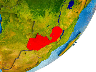 Zambia on 3D model of Earth with water and divided countries.