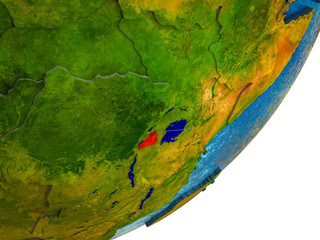 Rwanda on 3D model of Earth with water and divided countries.