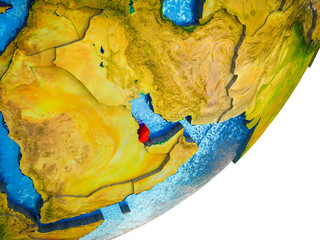 Qatar on 3D model of Earth with water and divided countries.