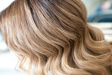 hairstyle female curls on dark hair