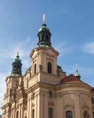 Fototapeta na wymiar PRAGUE, CZECH REPUBLIC - OCTOBER 09, 2018: The Church of St. Nicholas on Old Town Square