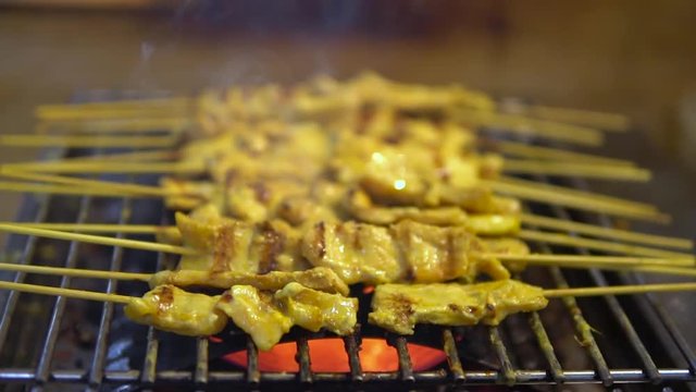 Moo Sa Tae Thai traditional food, Fermented pork with curry powder and grill with herb on the charcoal.Good tase delicious and famous in Thai restaurant.street food market in Thailand.