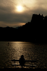 Naklejka na ściany i meble silhouetted lake scene