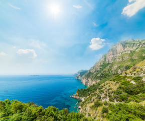 Fototapeta na wymiar Sun shining over world famous Amalfi Coast