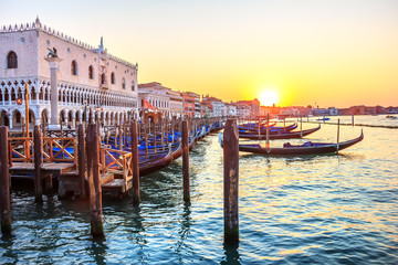The Doge's Palace and gondolas piers in the Grand Canal of Venic