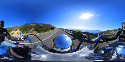 Fototapeta na wymiar 360 vr image of a classic motorcycle ride on a coastal road in Sardinia, Italy