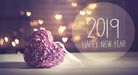 New Year 2019 message with a pink heart with heart shaped lights