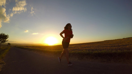 Fototapeta na wymiar Running at sunset.
