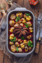 Top view of grilled octopus with potatoes