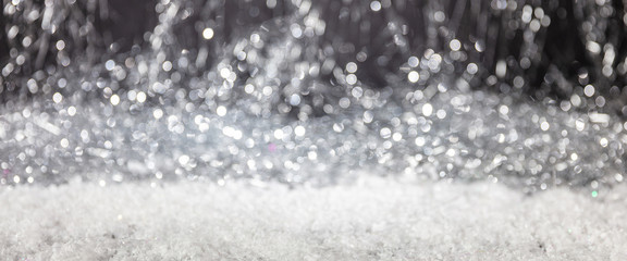 Snowing, Christmas time. Abstract bokeh lights background