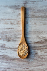 Wooden spoon with integral rice.