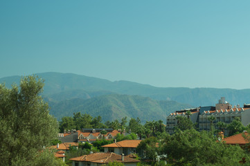 Mountain town panoramic view. city between the hills