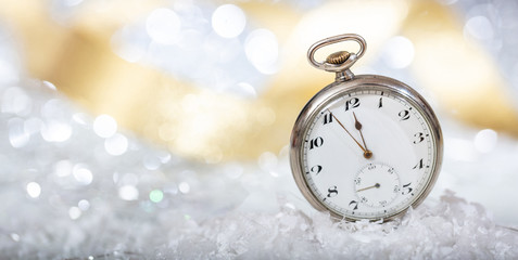 New Years eve. Minutes to midnight on an old pocket watch