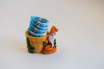 snowman with money for luck