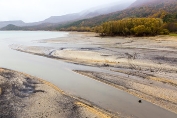 View of Barrea Lake almost dry, Lake Barrea, Abruzzo, Italy. October 13, 2017