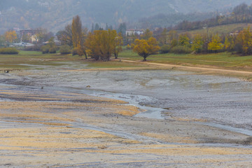 View of Barrea Lake almost dry, Lake Barrea, Abruzzo, Italy. October 13, 2017