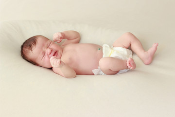 Portrait of a newborn baby laying on a blanket