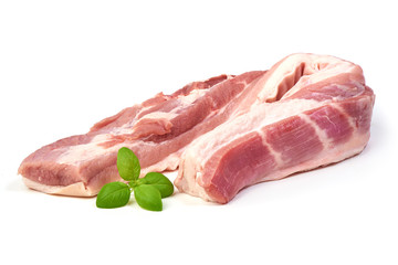 Fresh Raw Pork Tenderloin with basil leaves, isolated on a white background. Close-up.