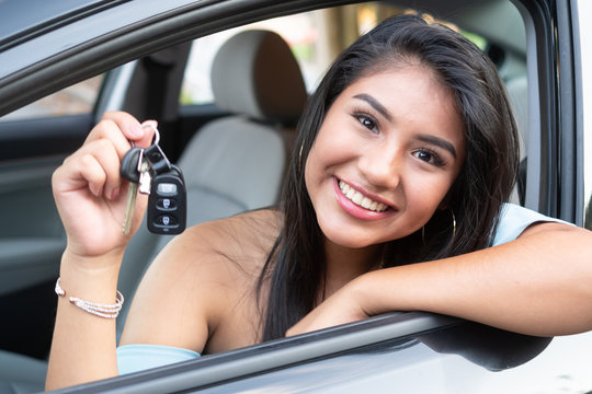 Teen Girl Driving A Car